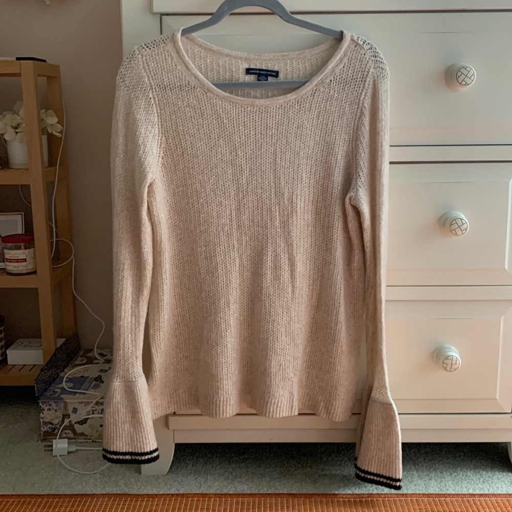 Women's tan sweater with flutter sleeves